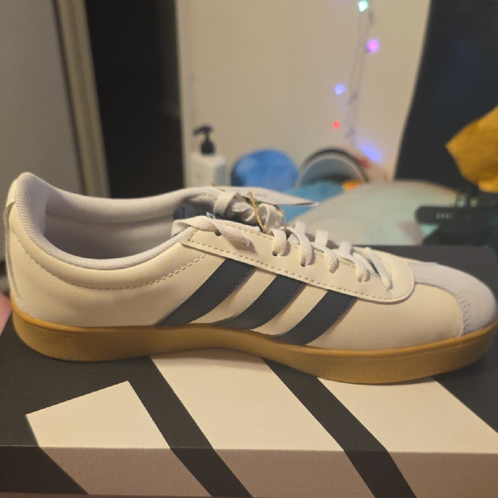 Adidas Women's White Sneakers with Black Stripes
